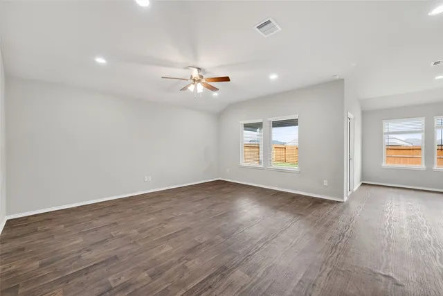 a view of kitchen with sink microwave and stove