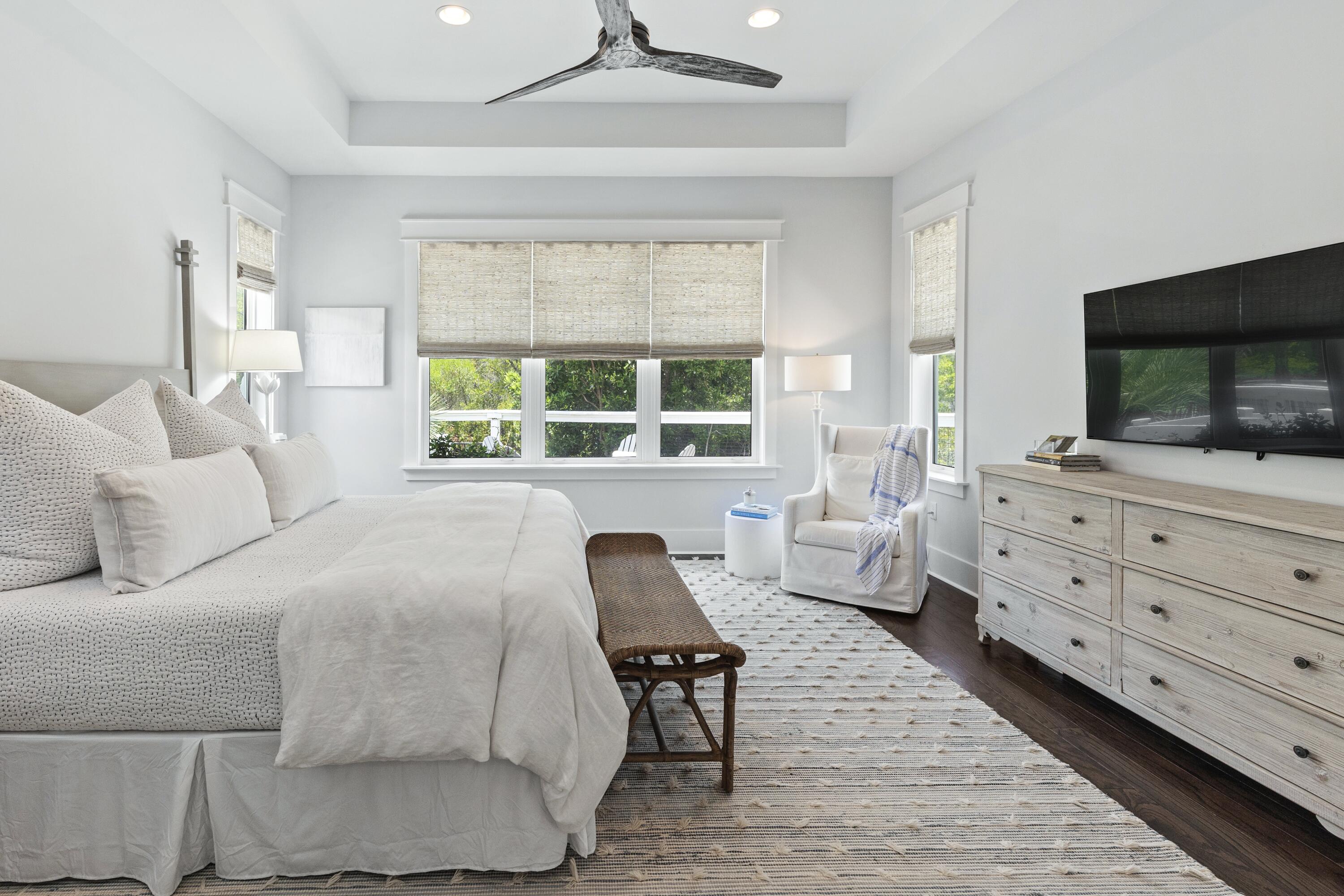 235 Prairie Pass Santa Rosa Beach, FL 32459 - Photo 21 of 80 a bedroom with a bed and a flat screen tv