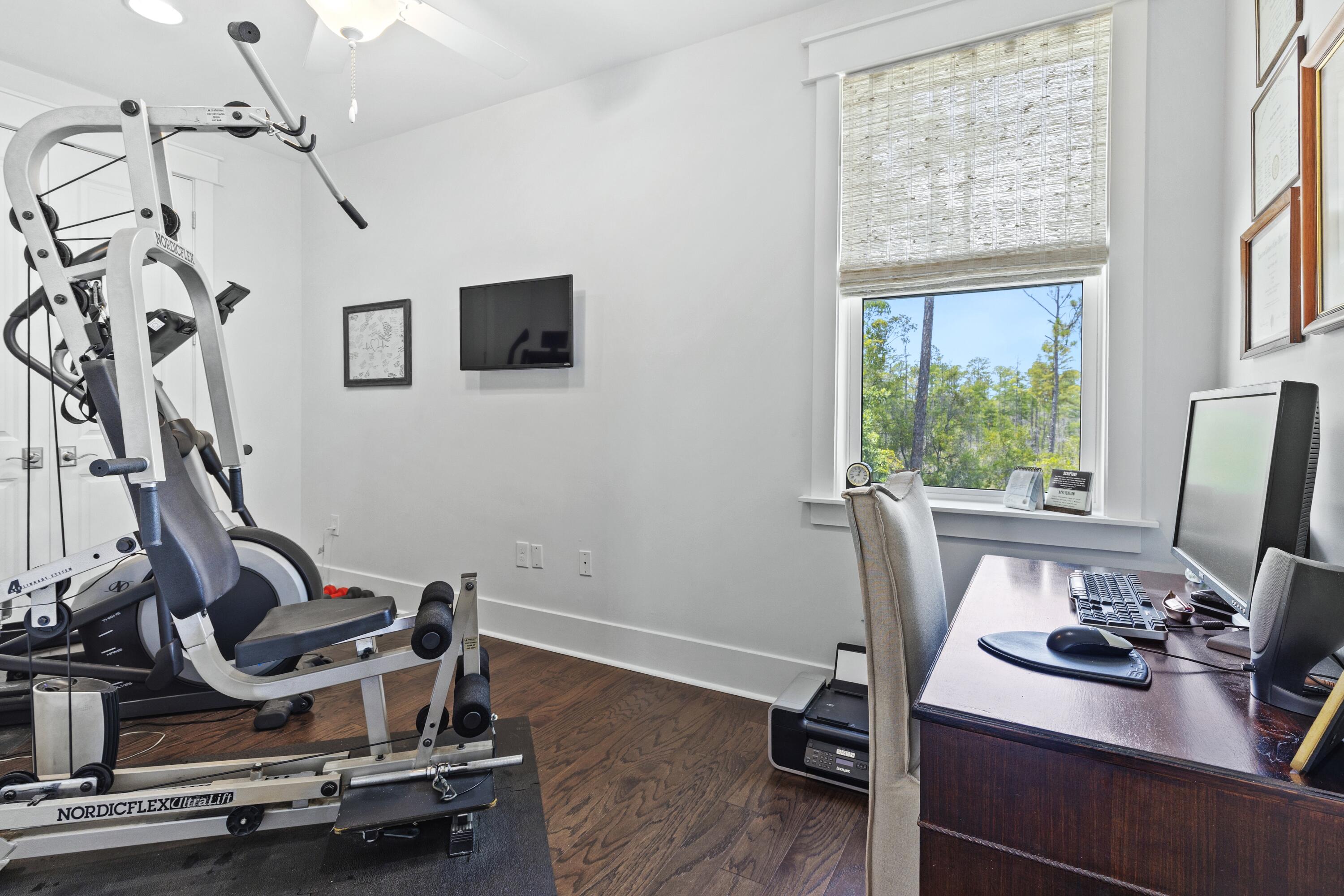 235 Prairie Pass Santa Rosa Beach, FL 32459 - Photo 30 of 80 a view of a workspace with furniture and a window