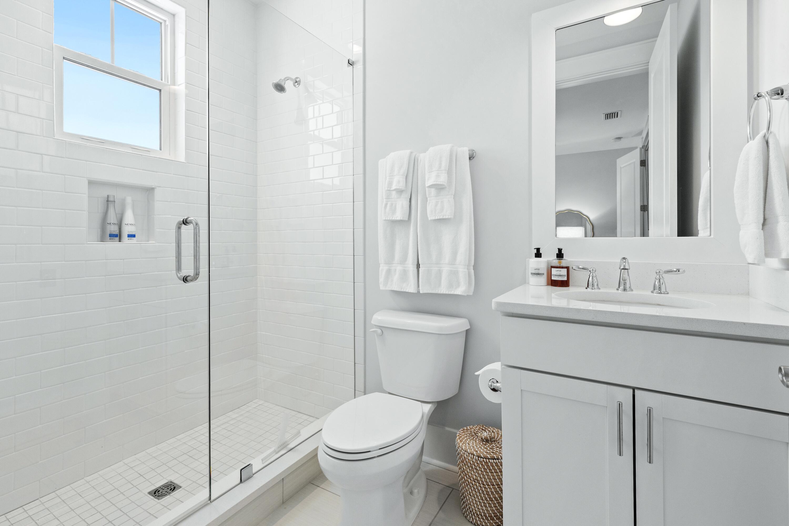 235 Prairie Pass Santa Rosa Beach, FL 32459 - Photo 37 of 80 a bathroom with a sink toilet and shower