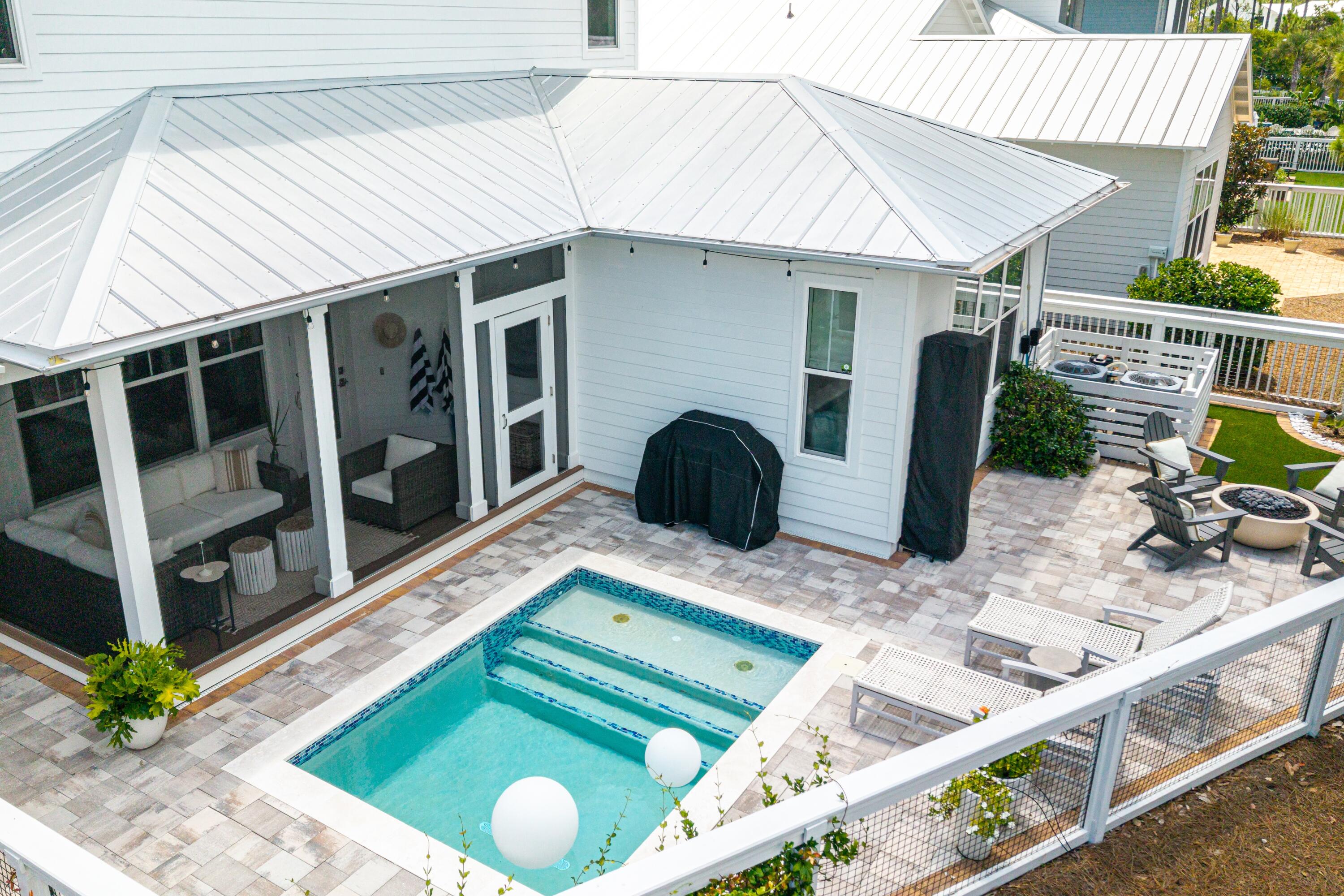 235 Prairie Pass Santa Rosa Beach, FL 32459 - Photo 51 of 80 a view of a house with backyard and sitting area