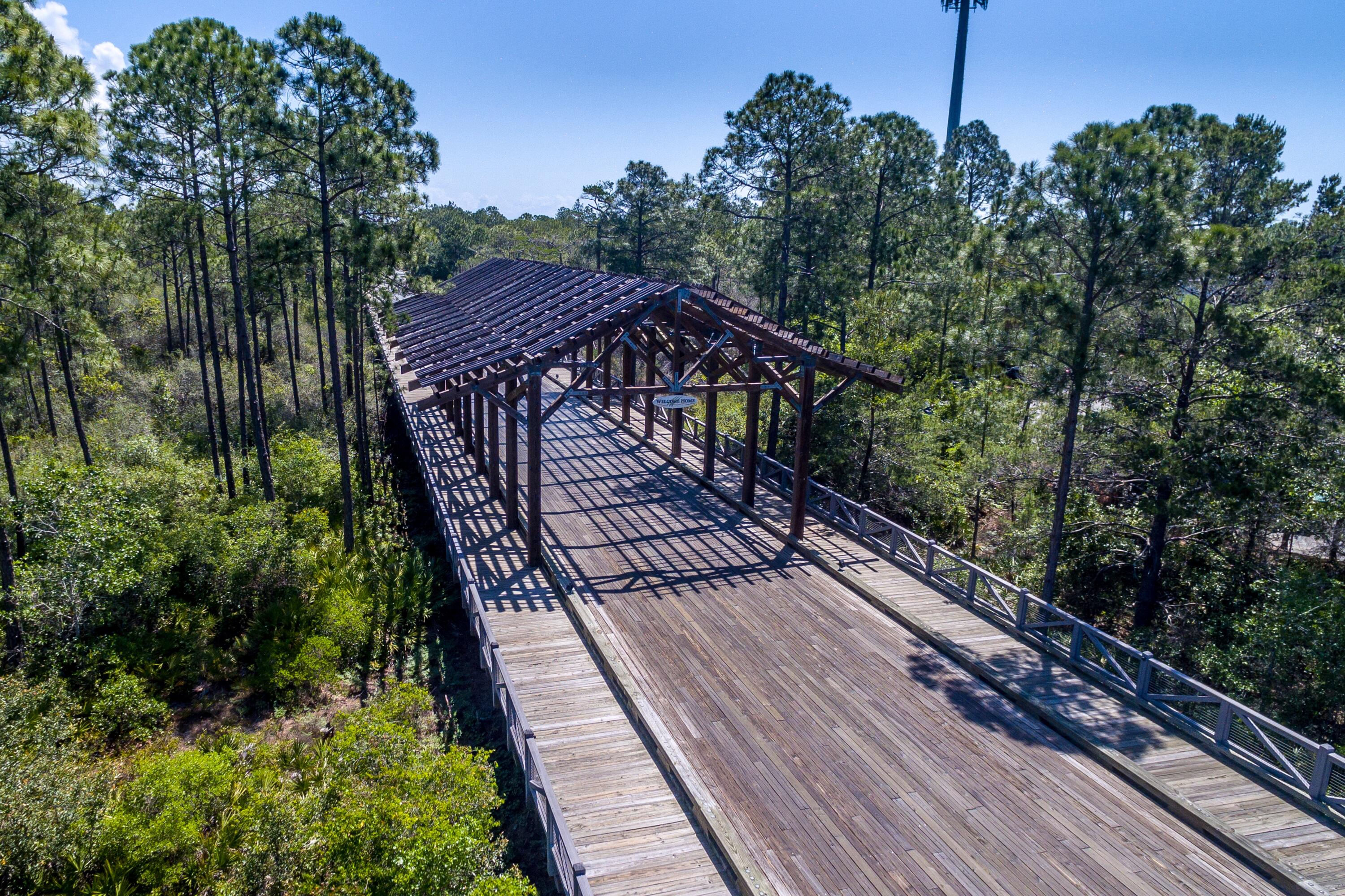 235 Prairie Pass Santa Rosa Beach, FL 32459 - Photo 80 of 80 a view of balcony with wooden floor and fence