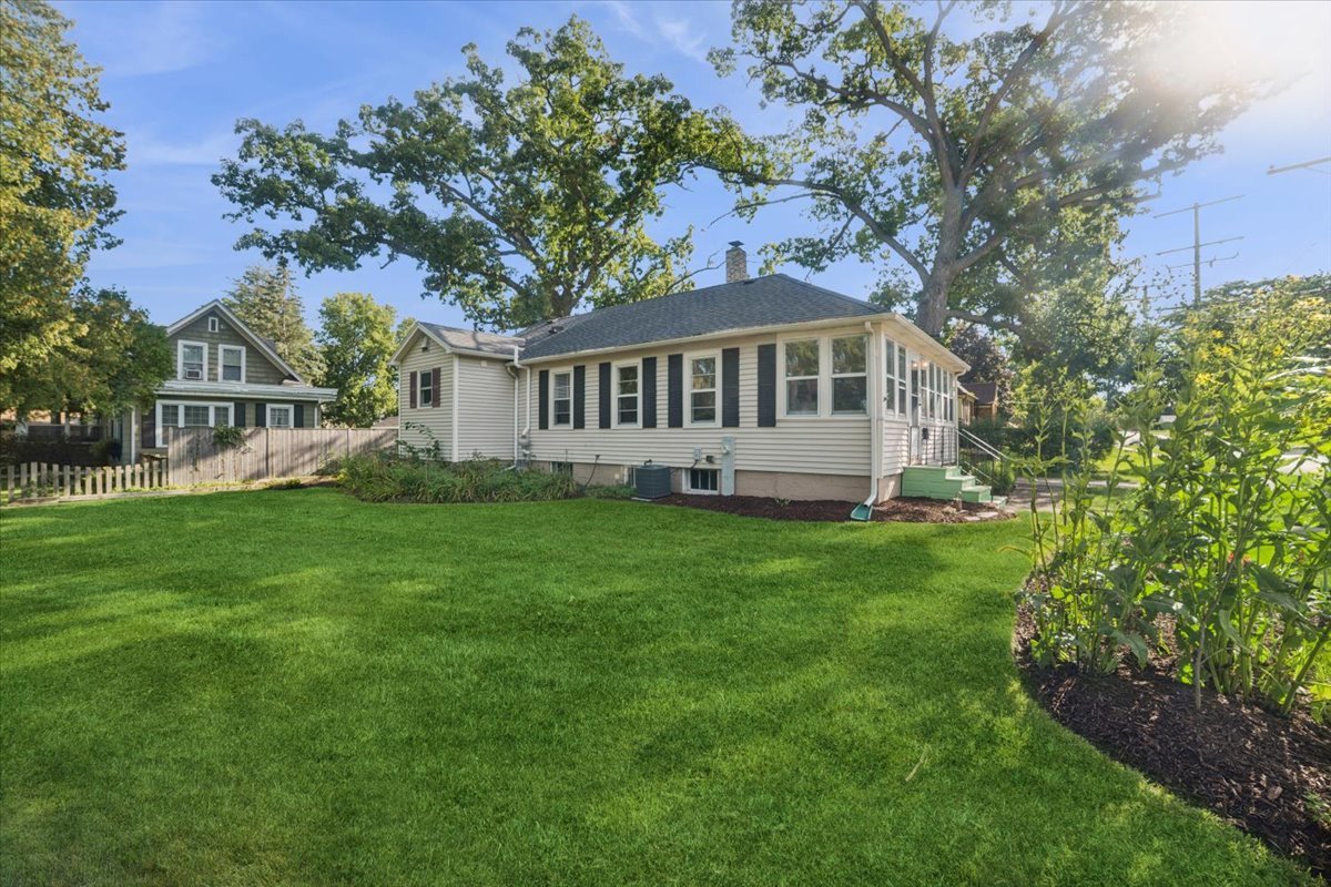 508 River Bluff Road Elgin, IL 60120 - Photo 13 of 17 a view of a house with a yard and sitting area