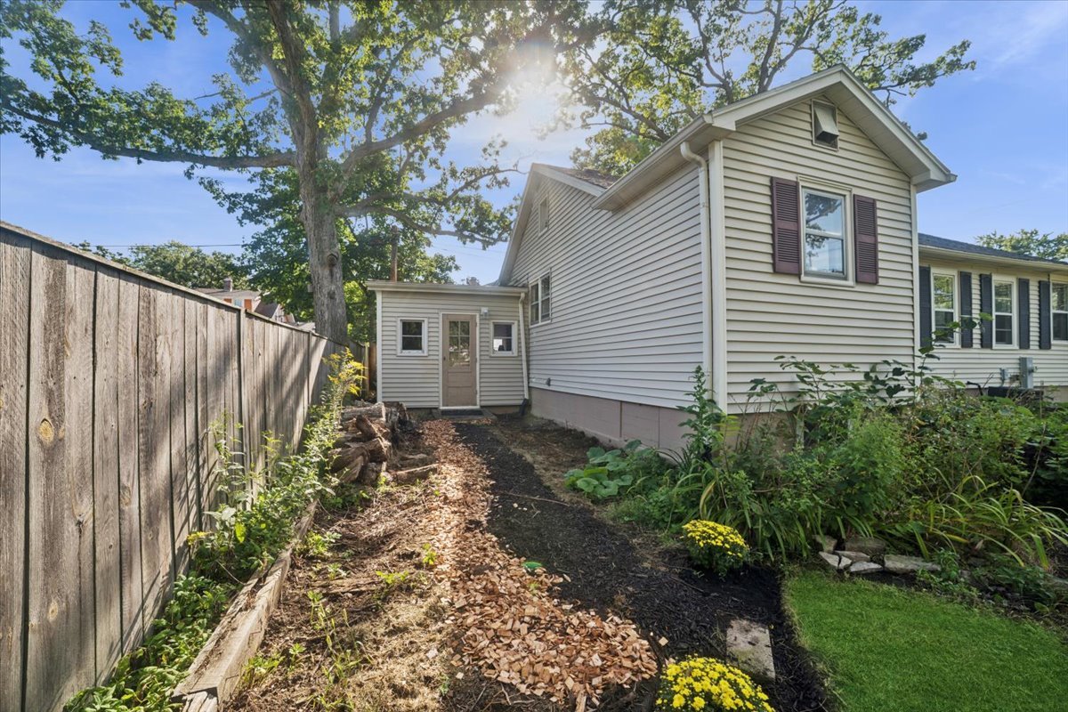 508 River Bluff Road Elgin, IL 60120 - Photo 15 of 17 a view of a house with a yard and pathway