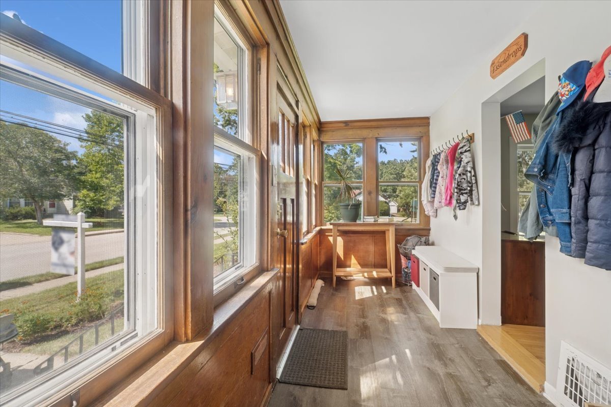 508 River Bluff Road Elgin, IL 60120 - Photo 2 of 17 a view of a entryway with furniture and floor to ceiling windows