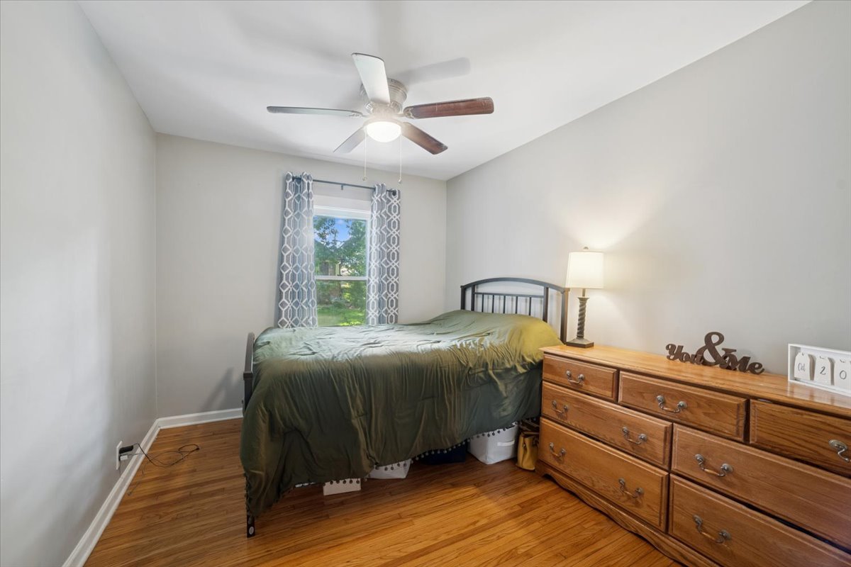 508 River Bluff Road Elgin, IL 60120 - Photo 7 of 17 a bedroom with a bed and window