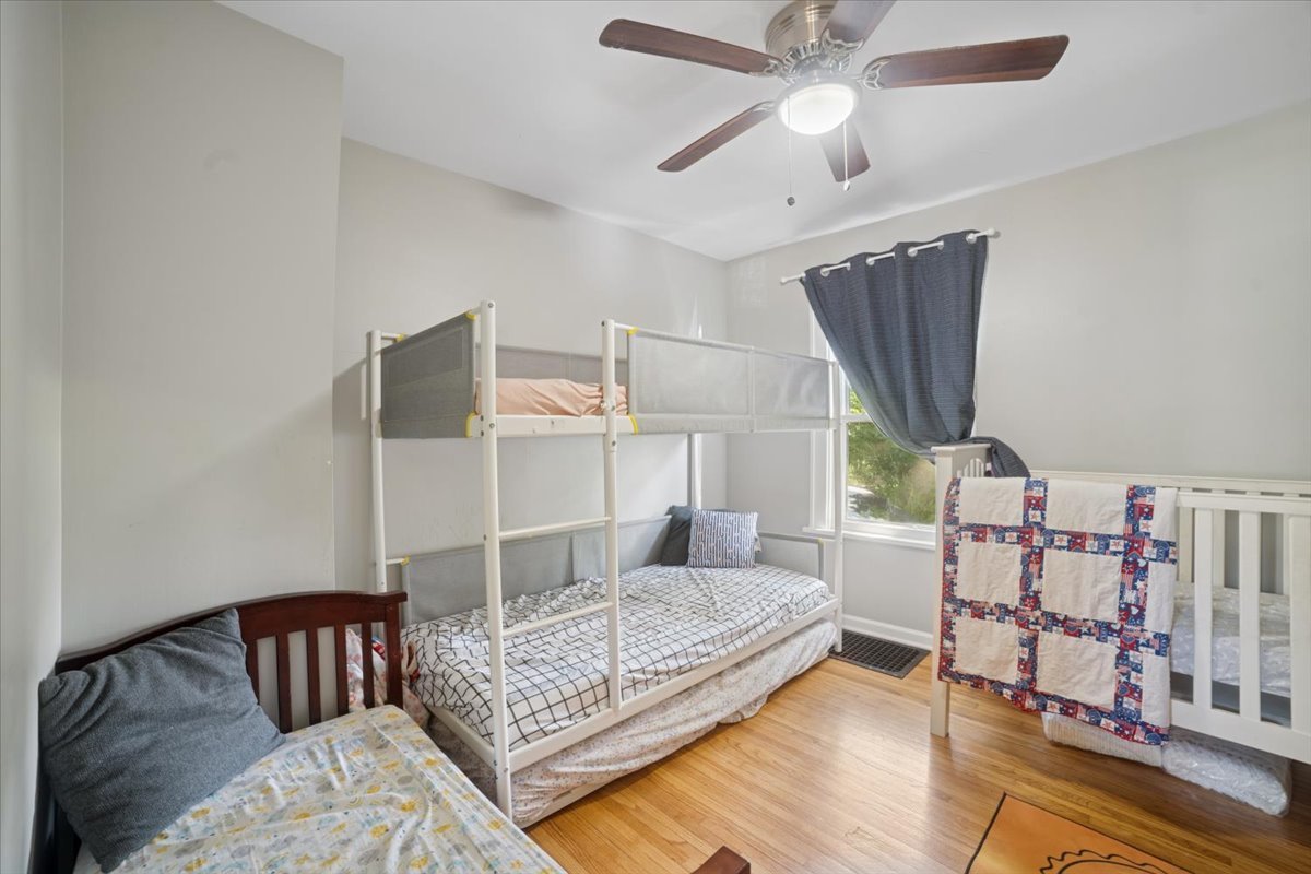 508 River Bluff Road Elgin, IL 60120 - Photo 8 of 17 a bedroom with furniture and a rug