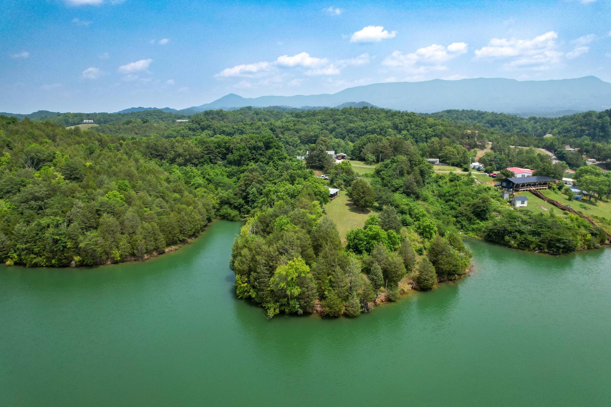 2751 Von Hill Road Dandridge, TN 37725 - Photo 4 of 29 a view of a city with lush green forest