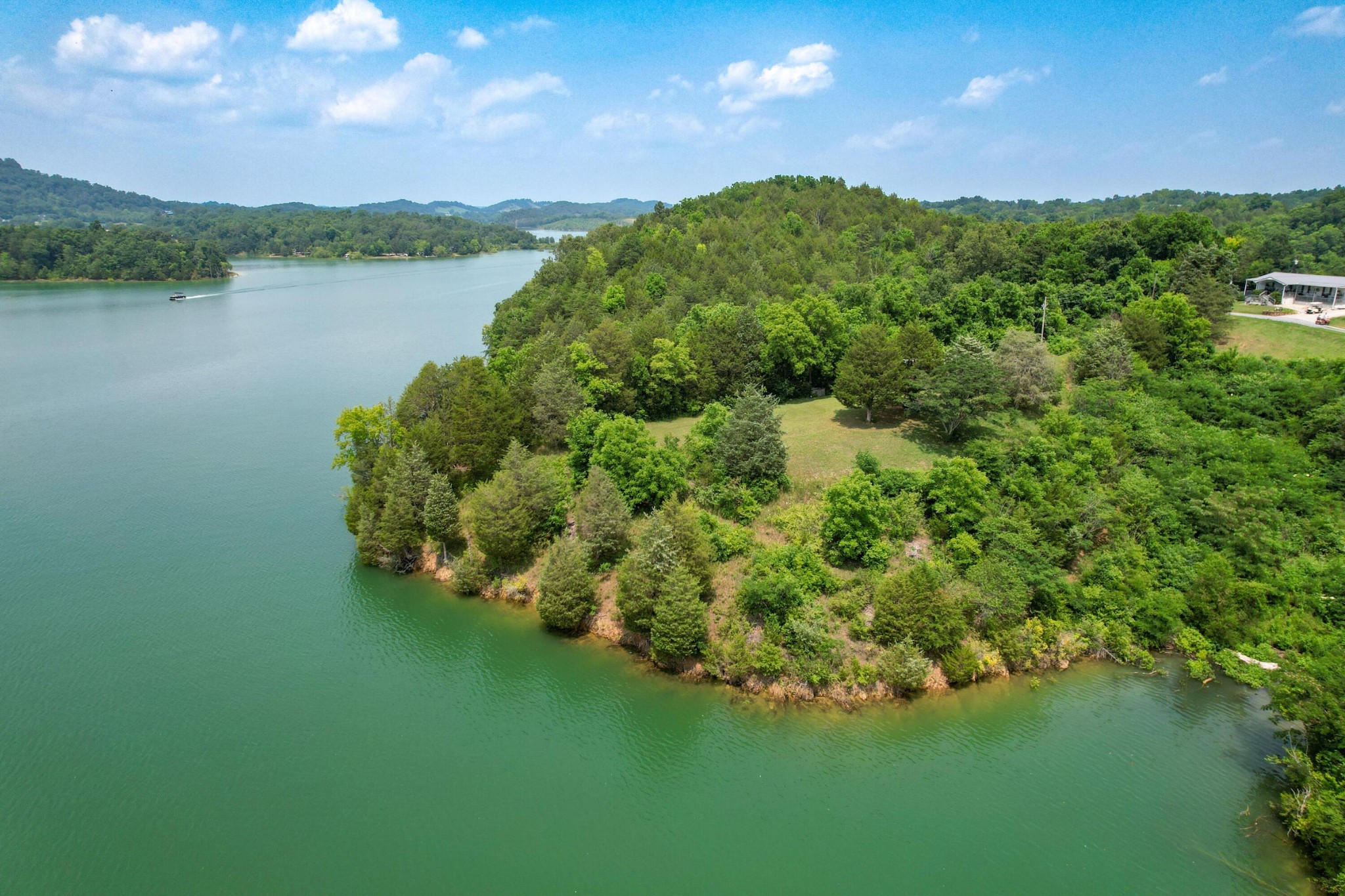 2751 Von Hill Road Dandridge, TN 37725 - Photo 5 of 29 a view of a garden with a lake