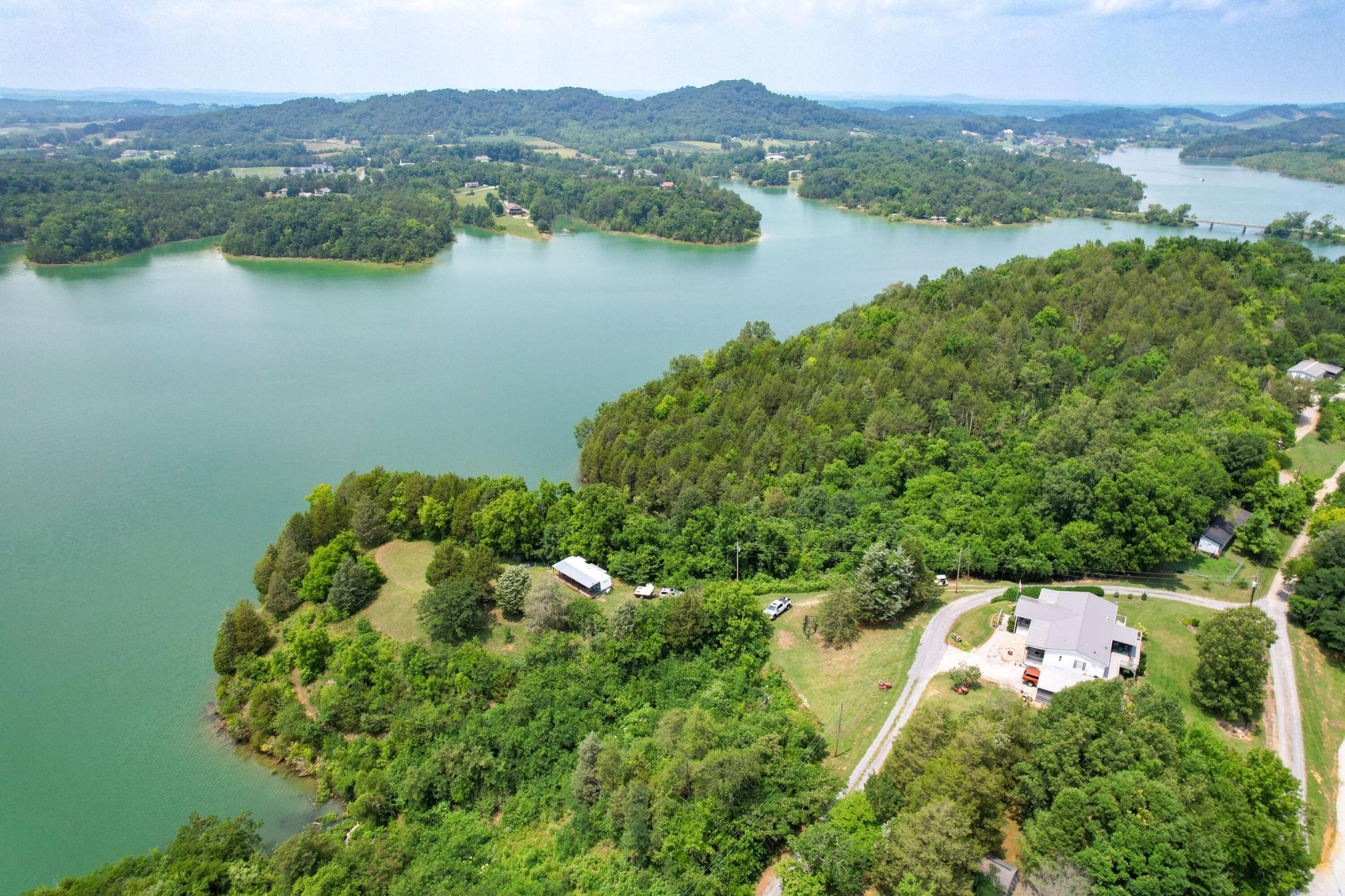 2751 Von Hill Road Dandridge, TN 37725 - Photo 10 of 29 a view of a lake with a mountain in the background