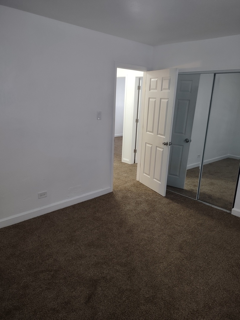 16549 California Avenue Markham, IL 60428 - Photo 12 of 14 a view of an empty room with a window