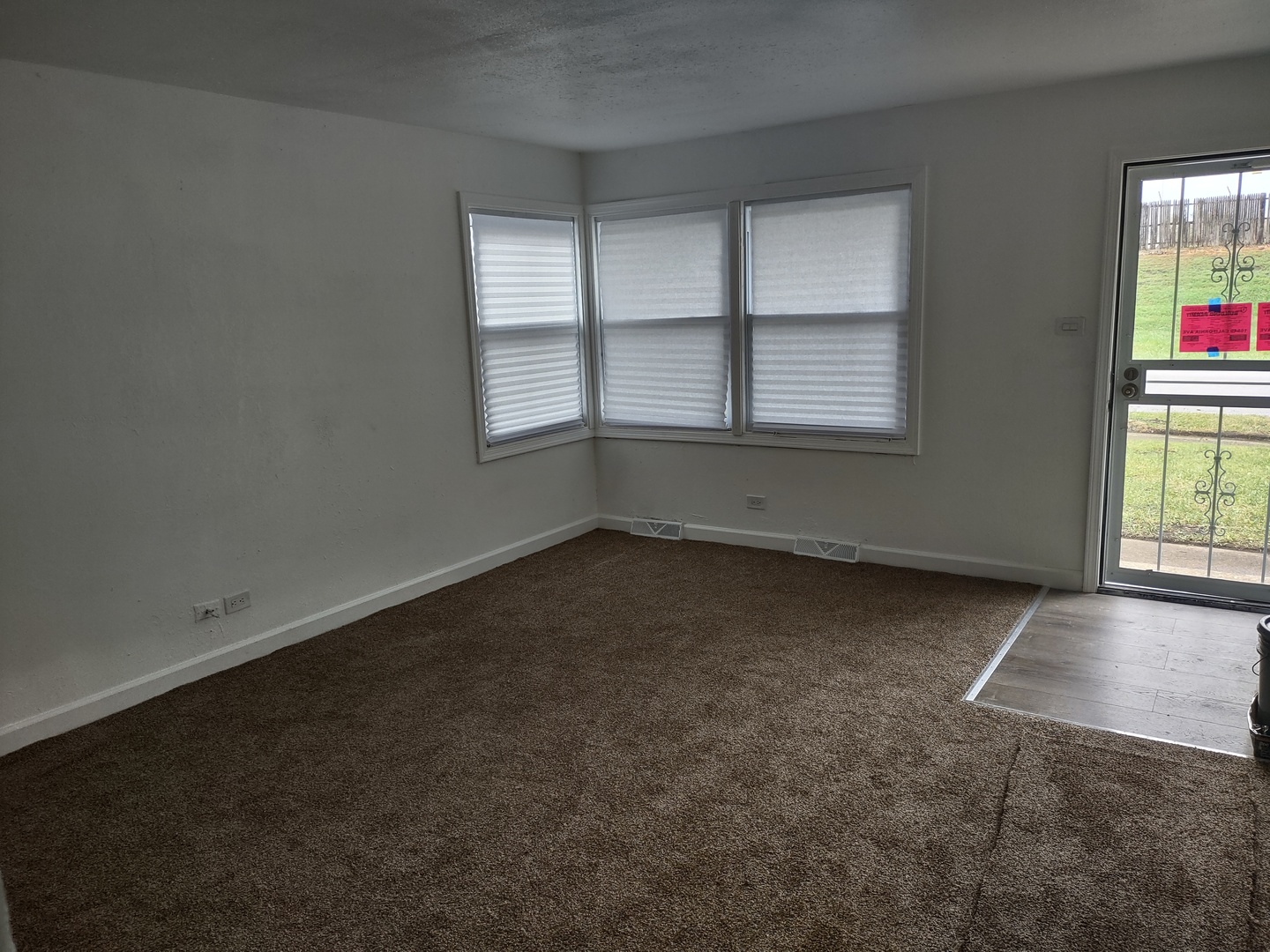 16549 California Avenue Markham, IL 60428 - Photo 3 of 14 an empty room with windows