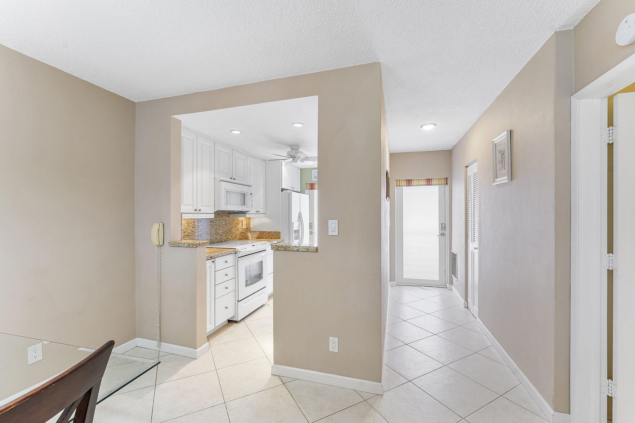 101 Northeast 19th Avenue, Unit 208 Deerfield Beach, FL 33441 - Photo 13 of 38 a bathroom with a sink and a mirror