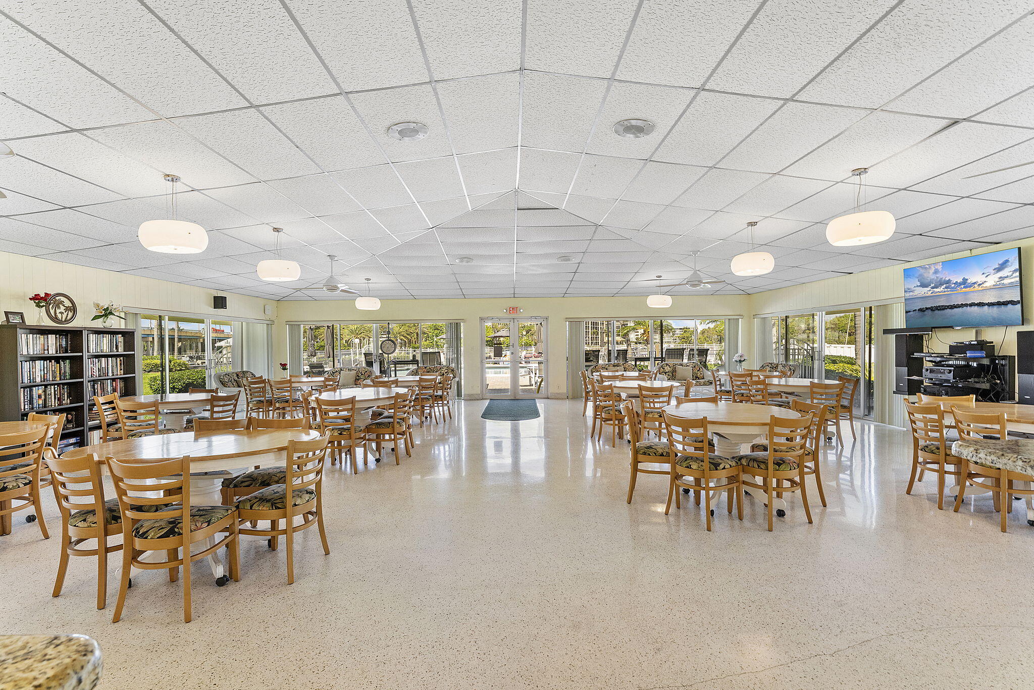 101 Northeast 19th Avenue, Unit 208 Deerfield Beach, FL 33441 - Photo 25 of 38 a view of a dining area with furniture