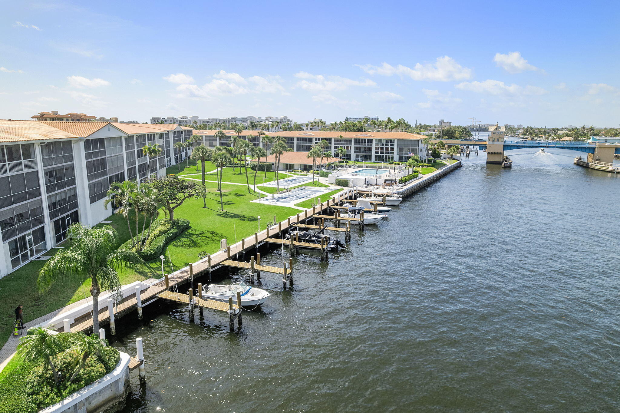 101 Northeast 19th Avenue, Unit 208 Deerfield Beach, FL 33441 - Photo 29 of 38 a view of swimming pool with outdoor seating and city view