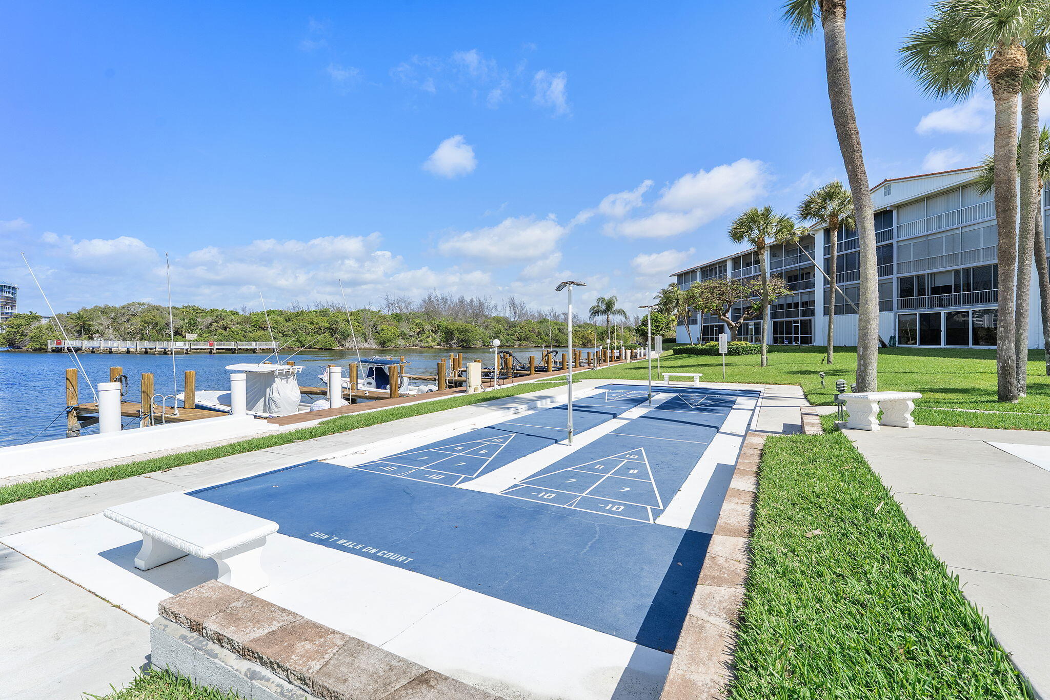 101 Northeast 19th Avenue, Unit 208 Deerfield Beach, FL 33441 - Photo 31 of 38 a view of swimming pool and lake view