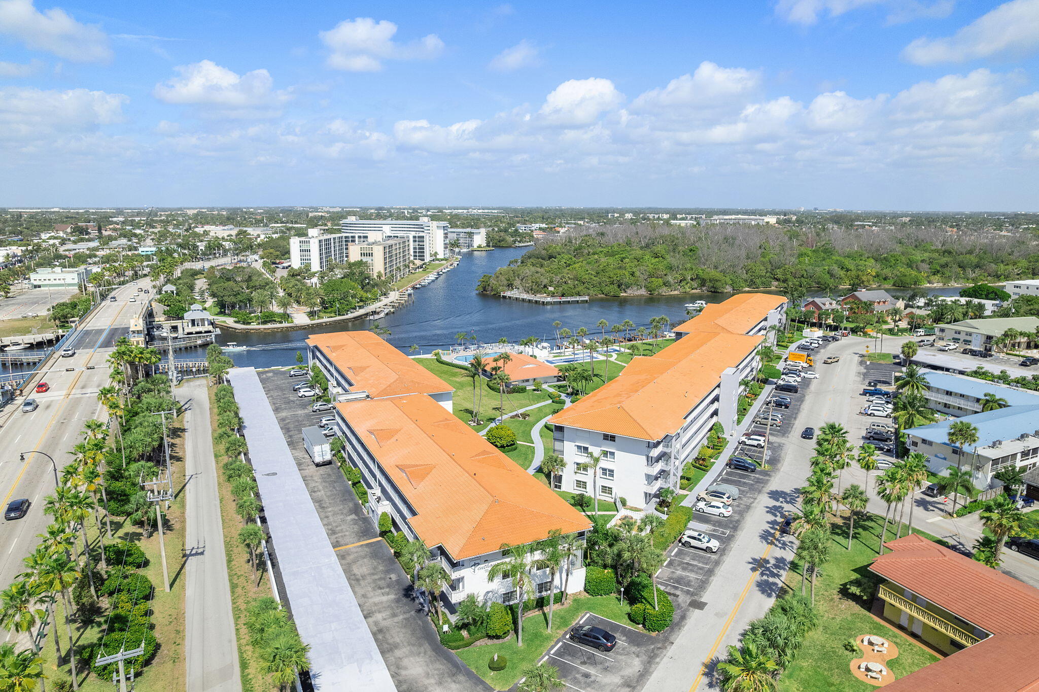 101 Northeast 19th Avenue, Unit 208 Deerfield Beach, FL 33441 - Photo 37 of 38 an aerial view of residential houses with outdoor space