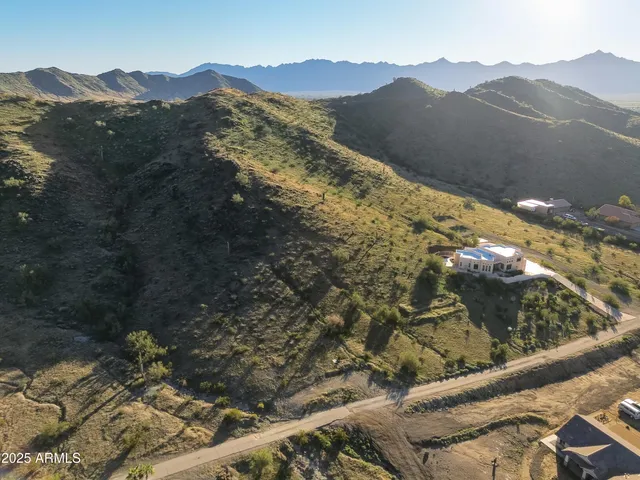 a view of a mountain from a balcony