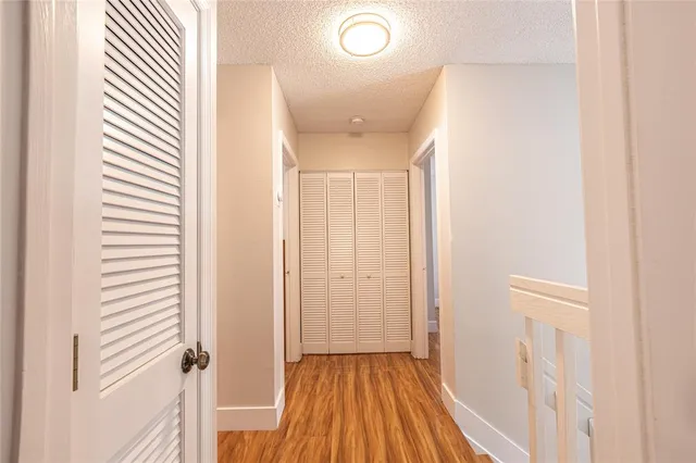 a view of an empty room with a large window