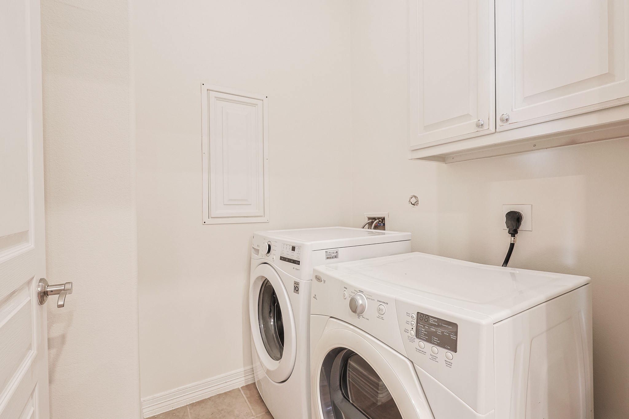 2540 Prospect Street, Unit C Houston, TX 77004 - Photo 29 of 31 a utility room with dryer and washer