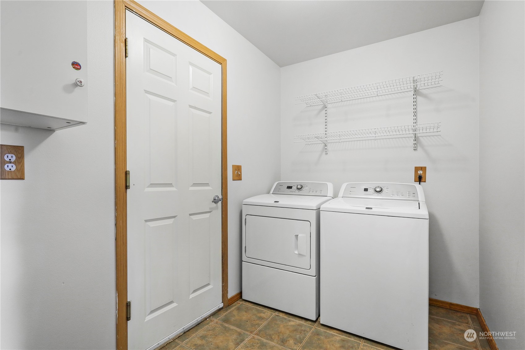 3116 289th Street South Roy, WA 98580 - Photo 15 of 38 a view of storage and utility room with washer and dryer