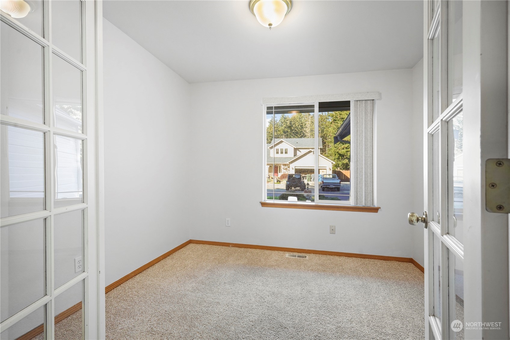 3116 289th Street South Roy, WA 98580 - Photo 17 of 38 a view of an empty room with a window