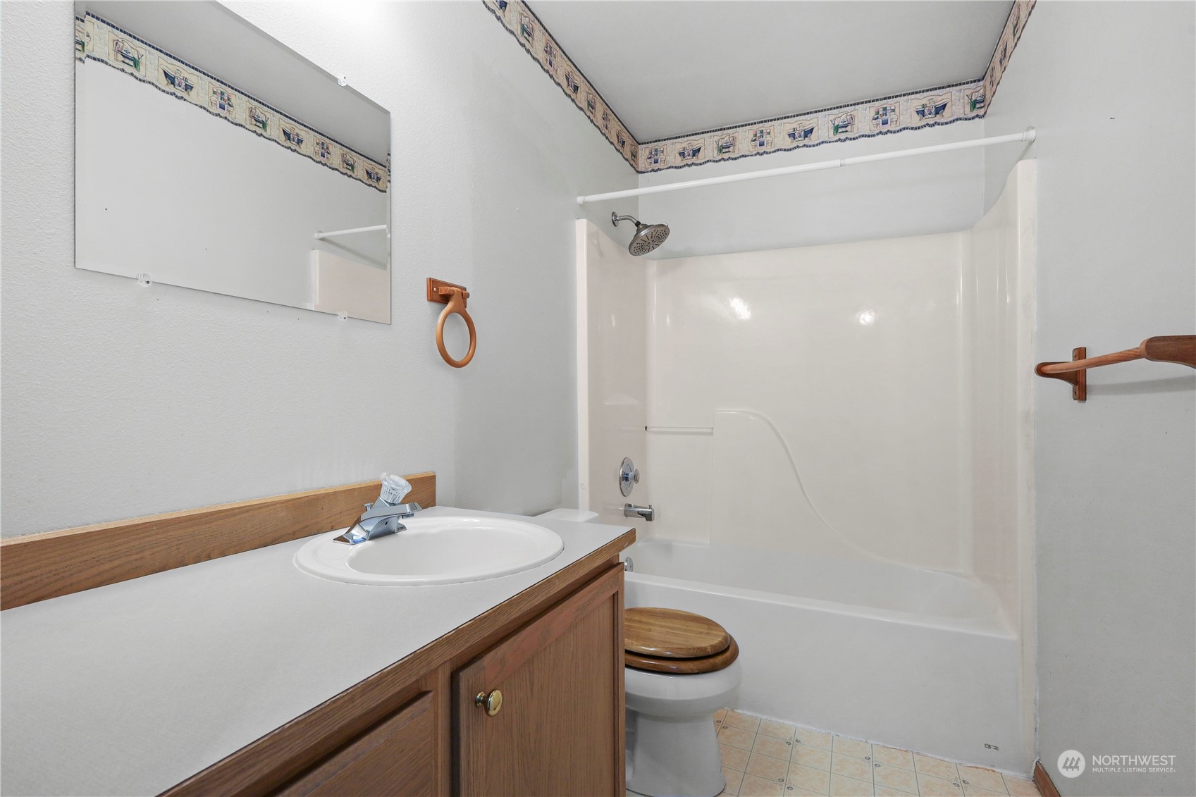 3116 289th Street South Roy, WA 98580 - Photo 24 of 38 a bathroom with a sink a toilet and shower