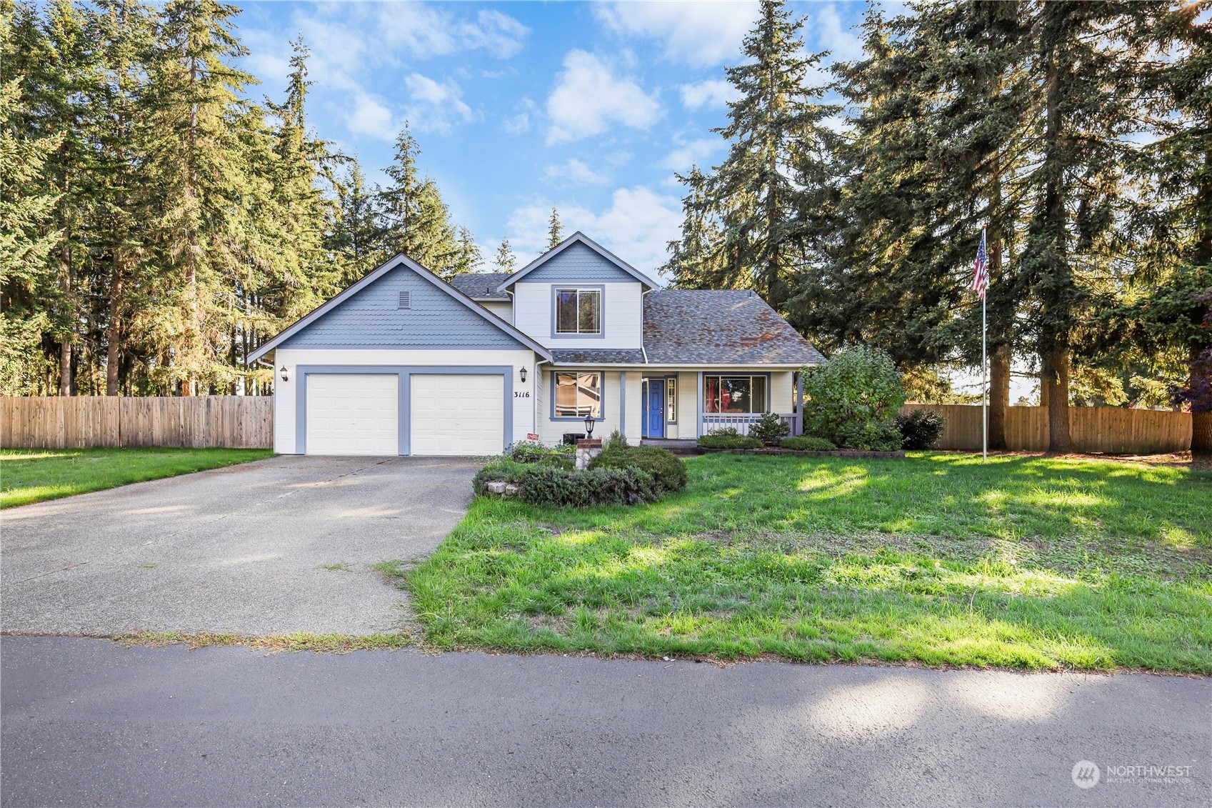 3116 289th Street South Roy, WA 98580 - Photo 37 of 38 a front view of a house with a yard