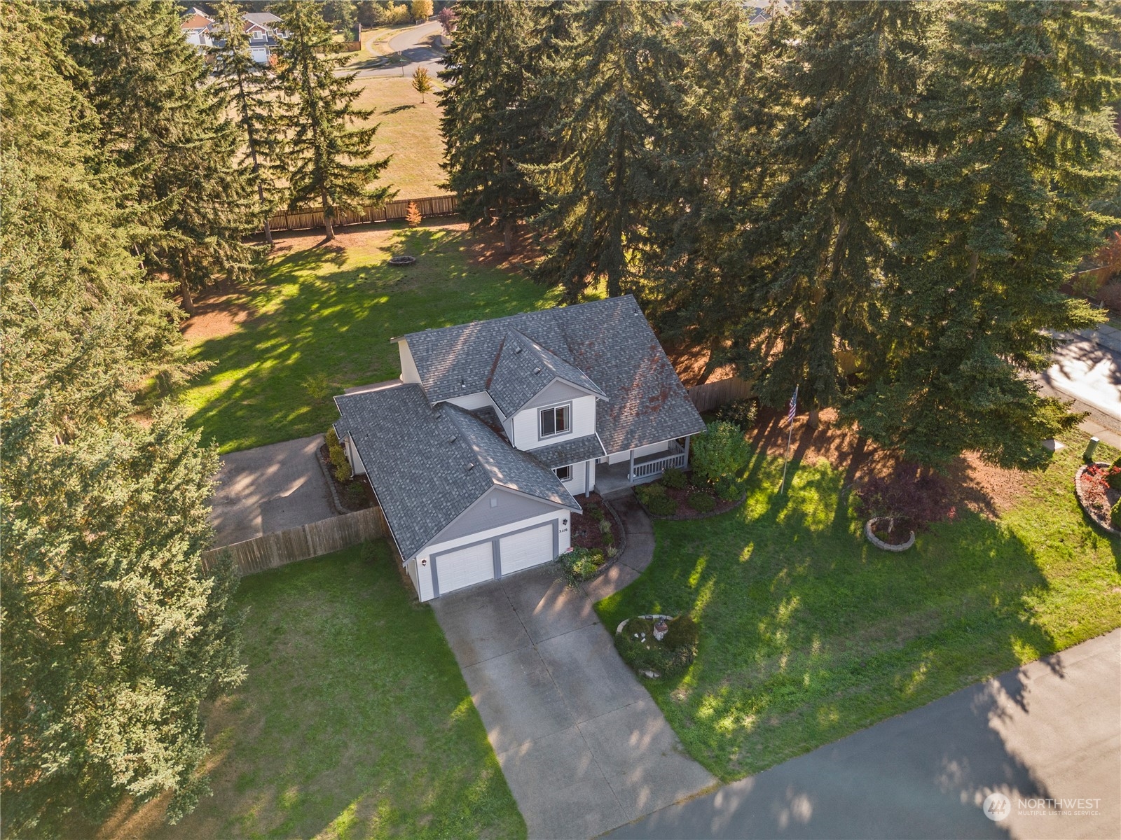 3116 289th Street South Roy, WA 98580 - Photo 6 of 38 an aerial view of a house with garden space and street view