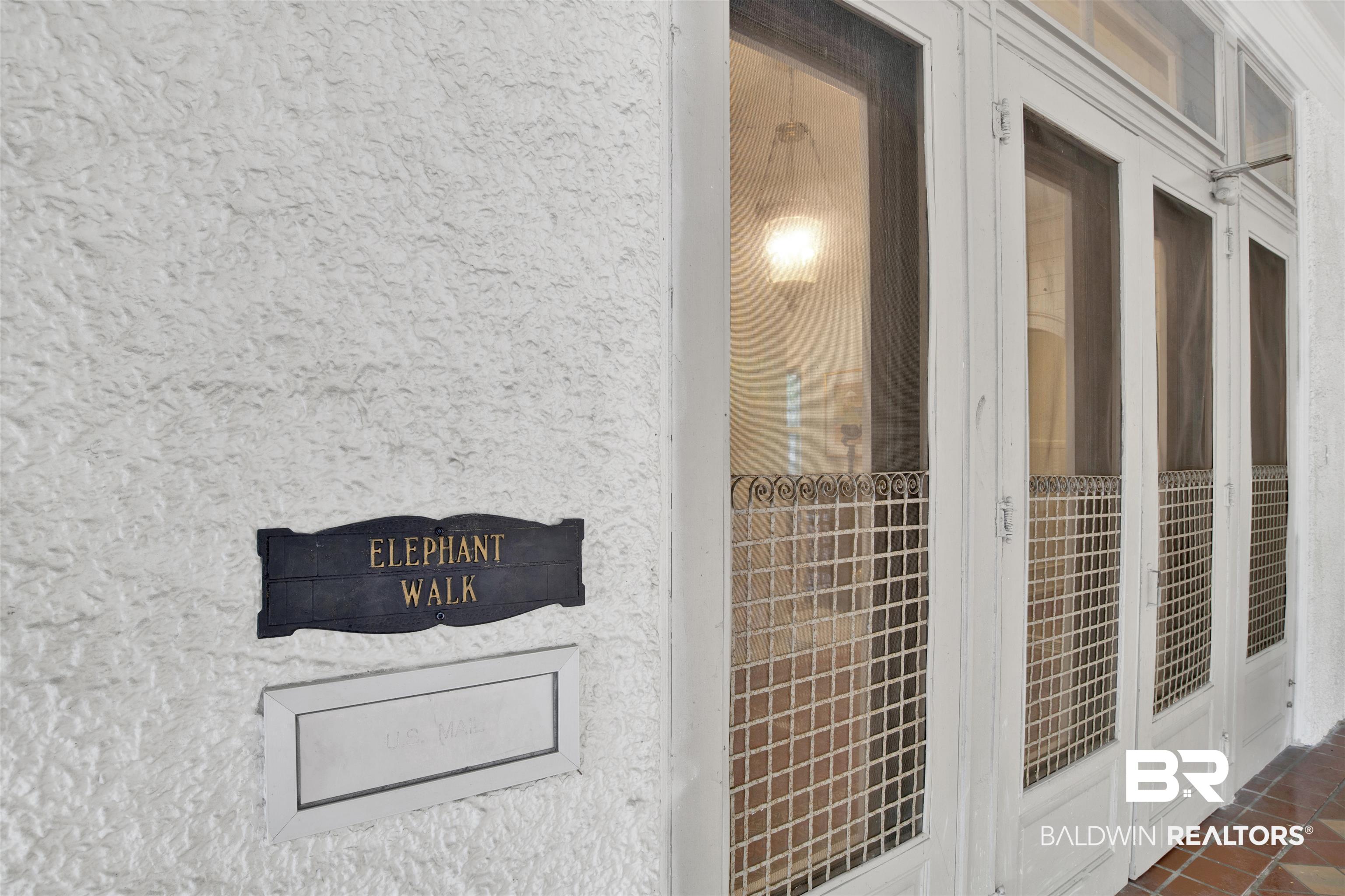 1654 Government Street Mobile, AL 36604 - Photo 8 of 45 Exterior space with french doors and tile patterned floors