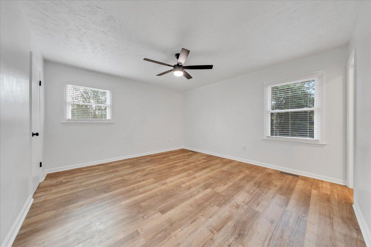 427 Farmington Road Hardy, VA 24101 - Photo 16 of 56 a view of a room with a ceiling fan and a window