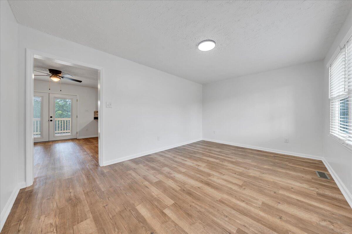 427 Farmington Road Hardy, VA 24101 - Photo 2 of 56 a view of empty room with wooden floor and fan