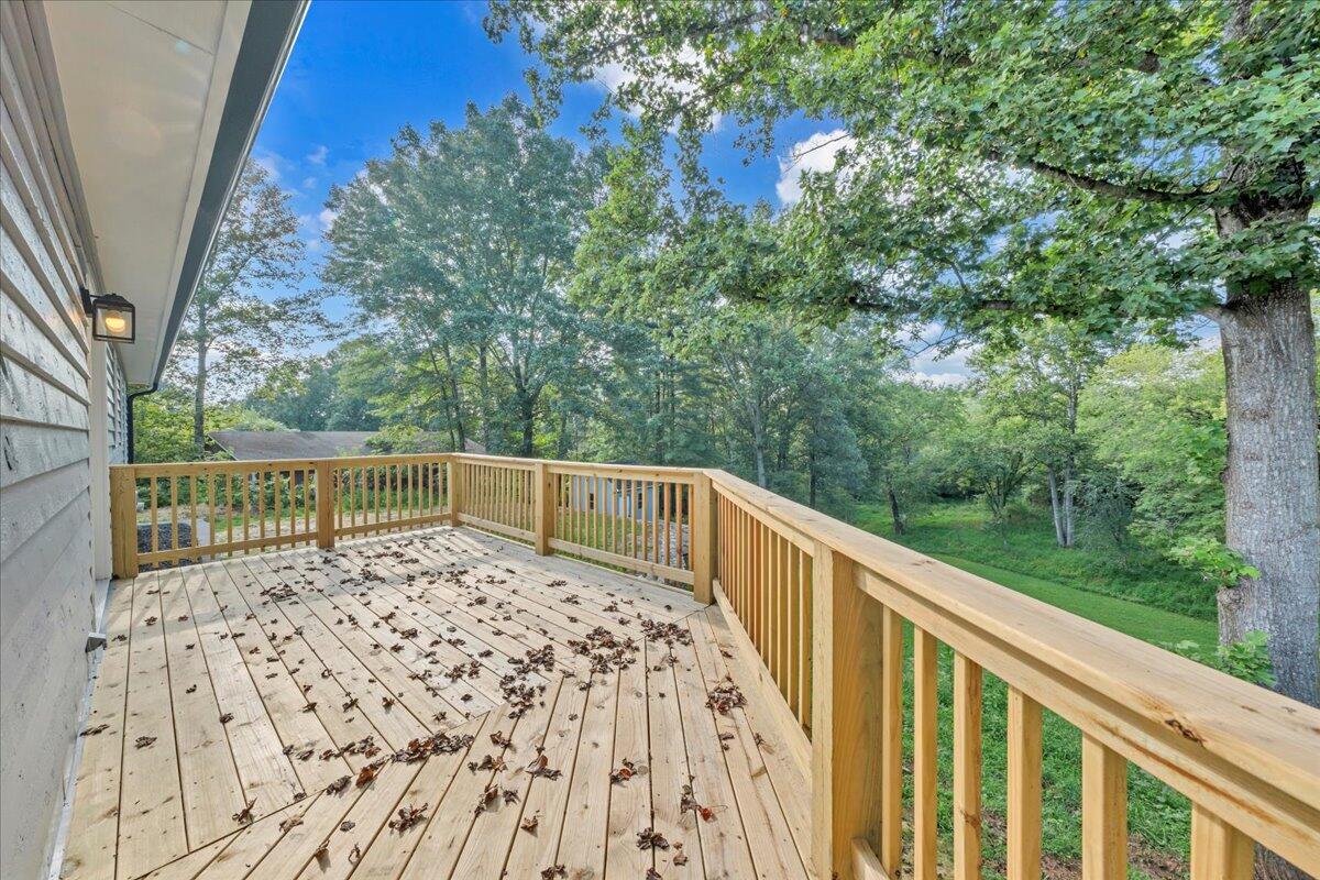 427 Farmington Road Hardy, VA 24101 - Photo 23 of 56 a view of balcony with wooden floor and fence