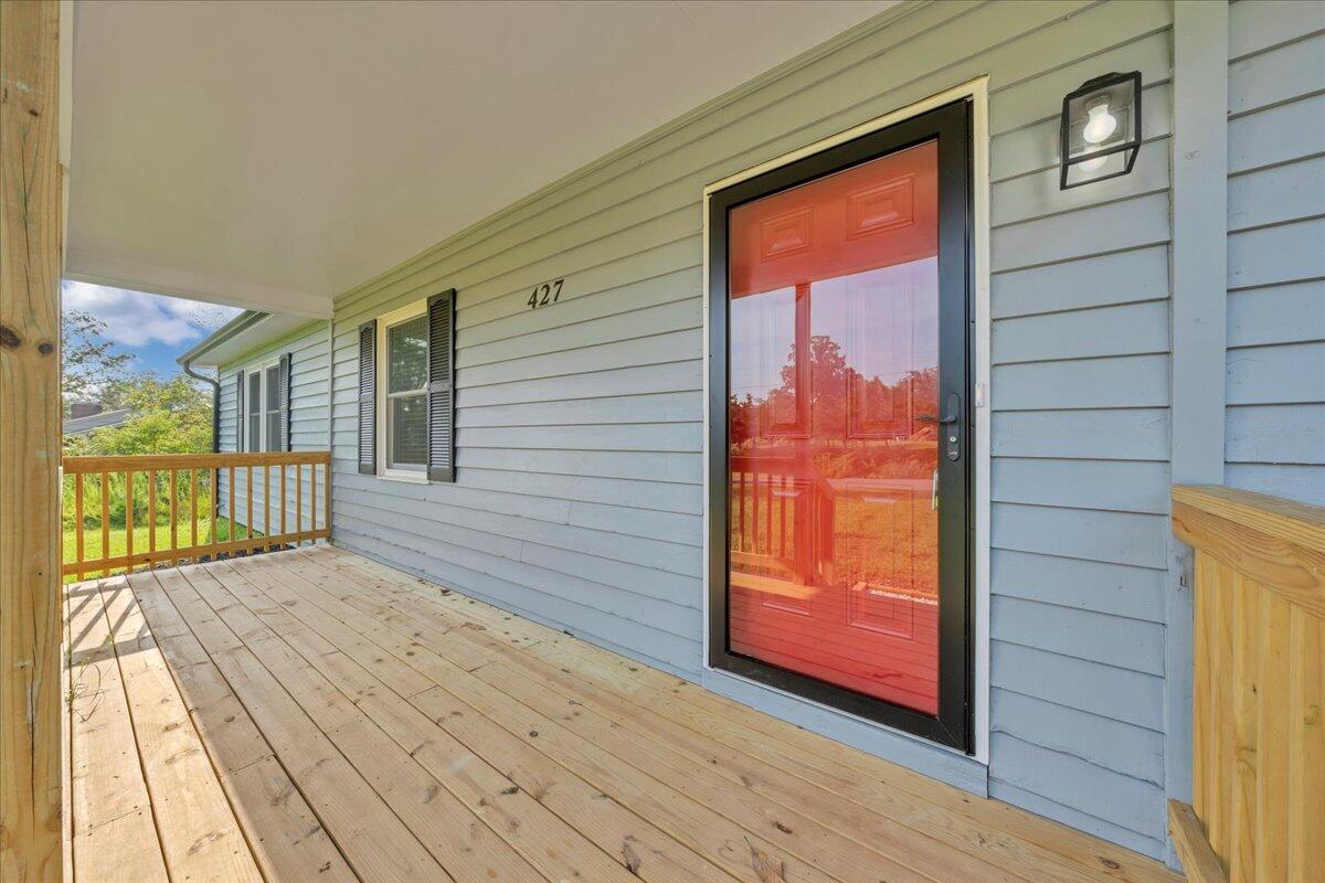 427 Farmington Road Hardy, VA 24101 - Photo 36 of 56 a view of a brick house with a balcony