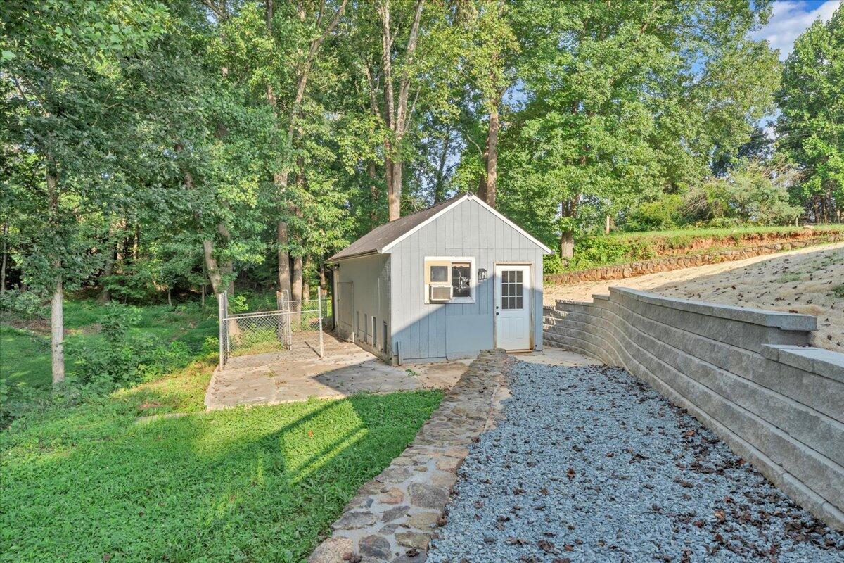 427 Farmington Road Hardy, VA 24101 - Photo 42 of 56 a front view of a house with a yard