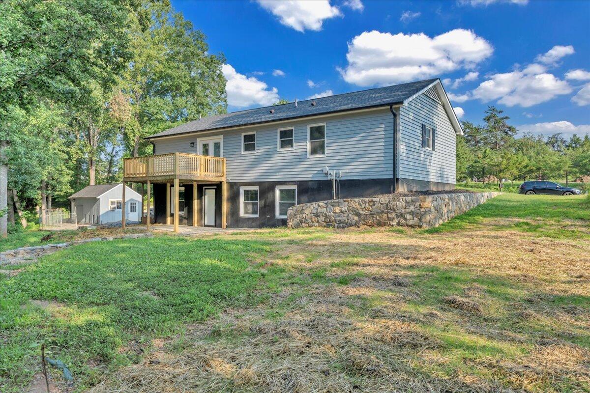 427 Farmington Road Hardy, VA 24101 - Photo 54 of 56 a view of a house with a yard porch and sitting area