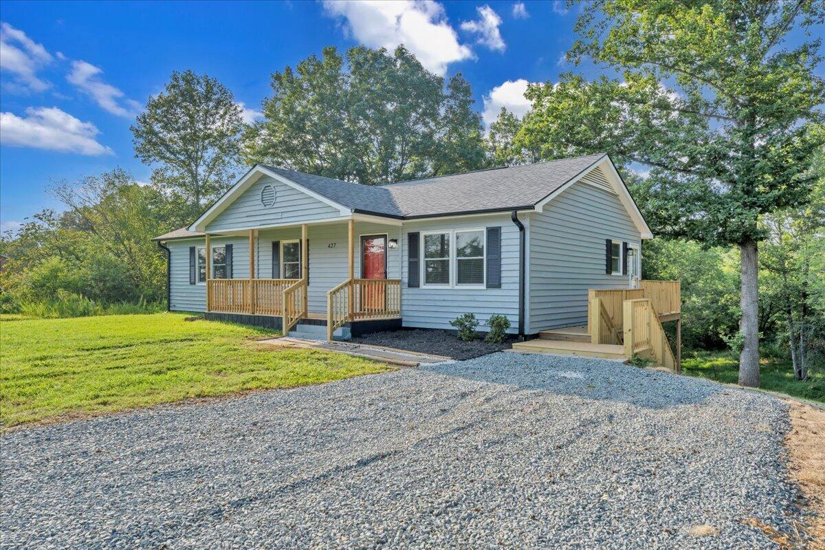 427 Farmington Road Hardy, VA 24101 - Photo 56 of 56 a view of a house with a yard and large tree
