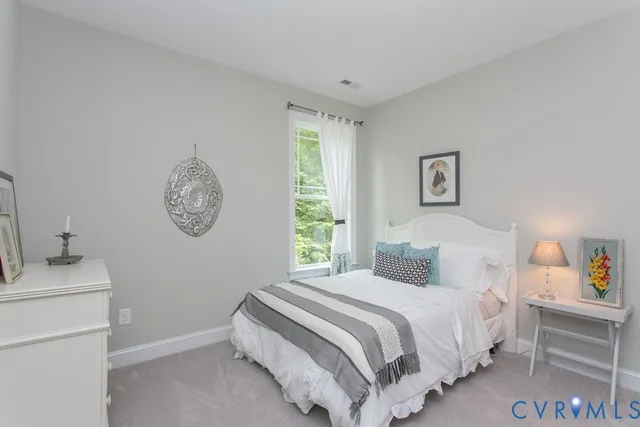 a view of entryway with wooden floor and stairs