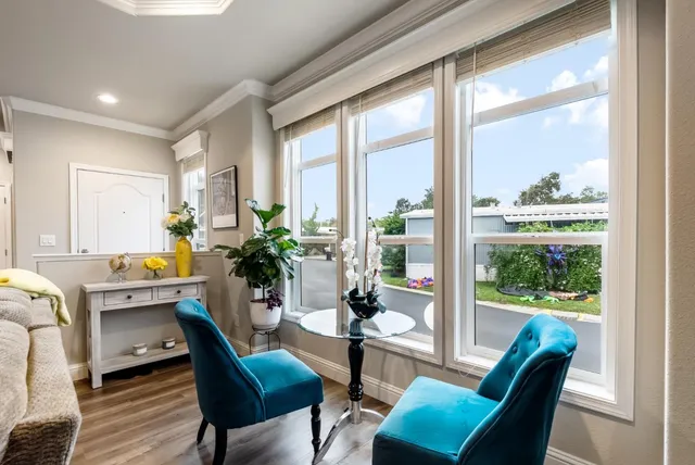 a room with furniture and a window