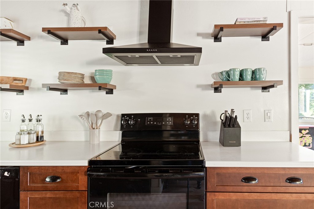 576 Kuffel Canyon Road Lake Arrowhead, CA 92352 - Photo 16 of 61 a close view of shoes stand and cabinets