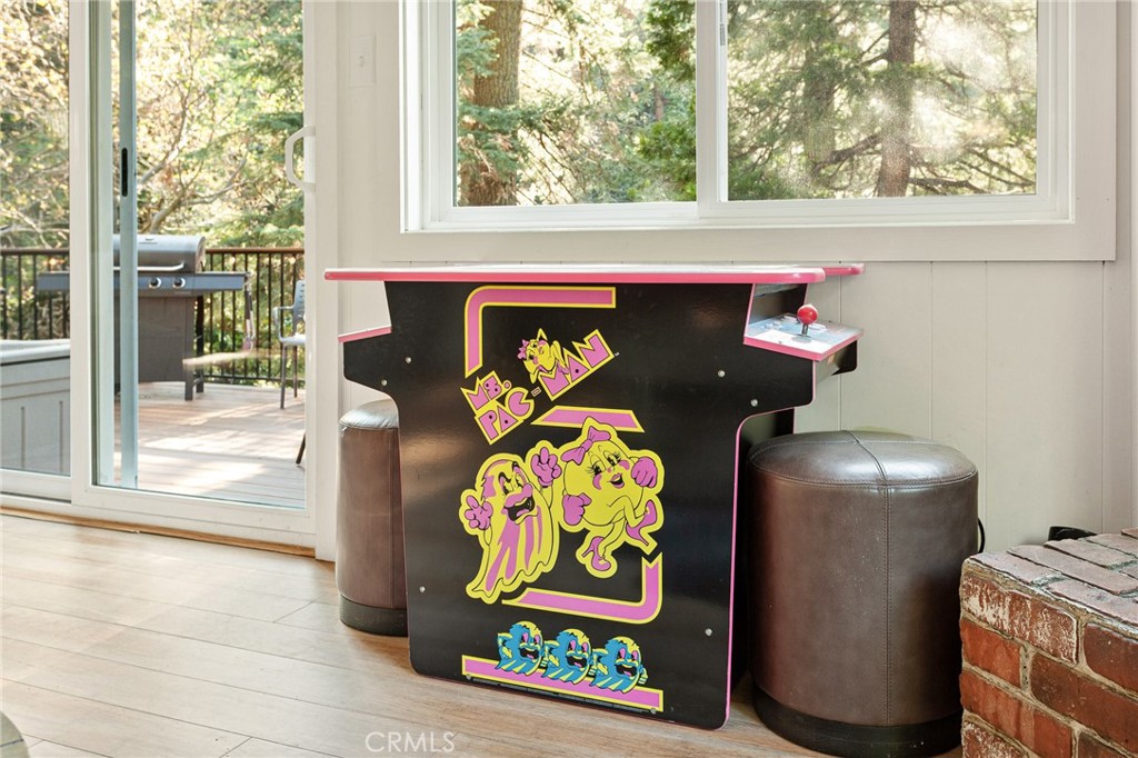 576 Kuffel Canyon Road Lake Arrowhead, CA 92352 - Photo 27 of 61 a front view of a house with swing and stairs