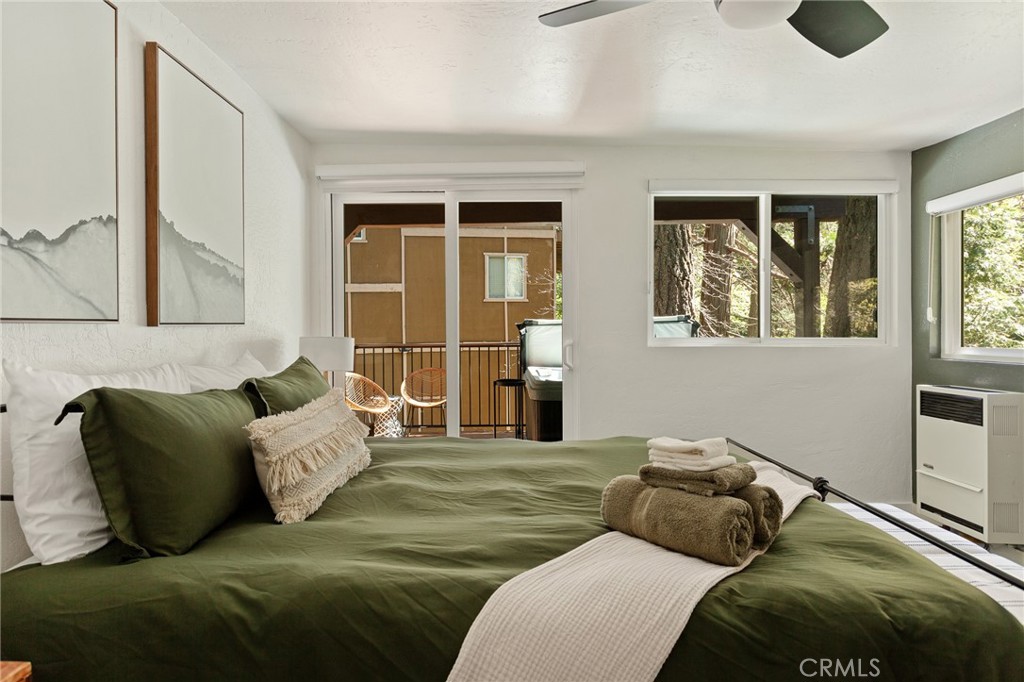 576 Kuffel Canyon Road Lake Arrowhead, CA 92352 - Photo 40 of 61 a living room with furniture and windows