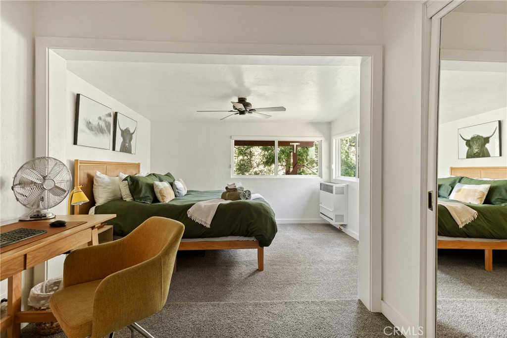 576 Kuffel Canyon Road Lake Arrowhead, CA 92352 - Photo 44 of 61 a living room with furniture and a window
