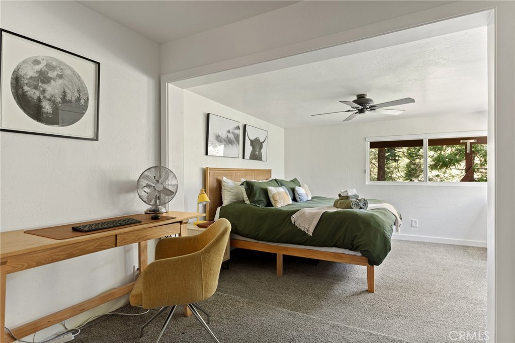 576 Kuffel Canyon Road Lake Arrowhead, CA 92352 - Photo 45 of 61 a living room with furniture and a window