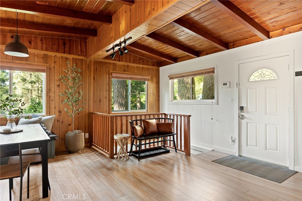 576 Kuffel Canyon Road Lake Arrowhead, CA 92352 - Photo 6 of 61 a view of a porch with furniture and window