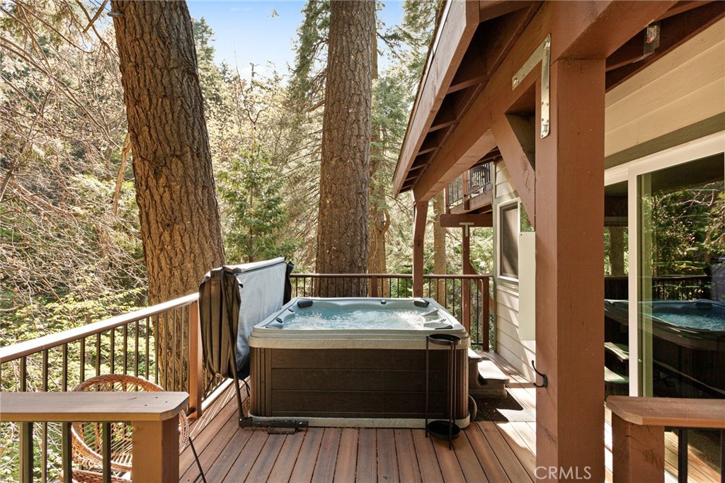 576 Kuffel Canyon Road Lake Arrowhead, CA 92352 - Photo 61 of 61 a view of balcony with wooden floor and outdoor seating