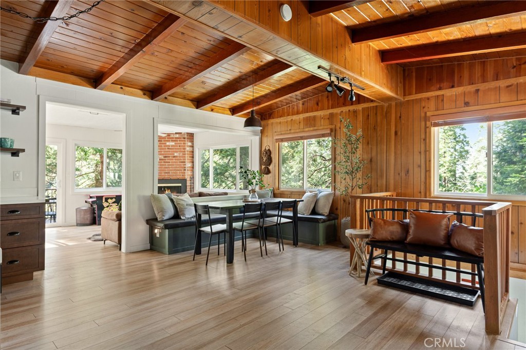 576 Kuffel Canyon Road Lake Arrowhead, CA 92352 - Photo 8 of 61 a living room with furniture and wooden floor