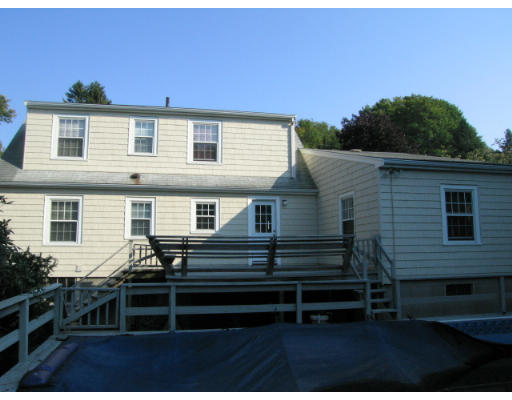 16 Booth Hill Road Scituate, MA 02066 - Photo 7 of 18 a front view of a house with a garden