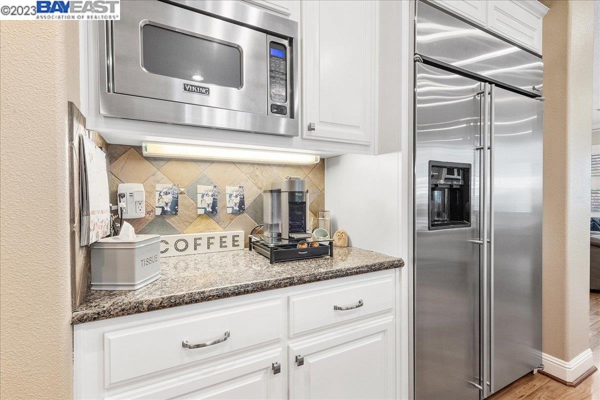Undisclosed Address San Ramon, CA 94583 - Photo 27 of 57 a view with granite countertop stainless steel appliances and cabinets