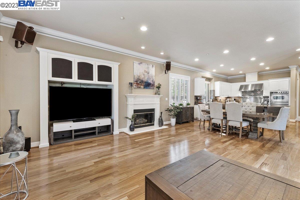 Undisclosed Address San Ramon, CA 94583 - Photo 29 of 57 a living room with furniture a flat screen tv and kitchen view